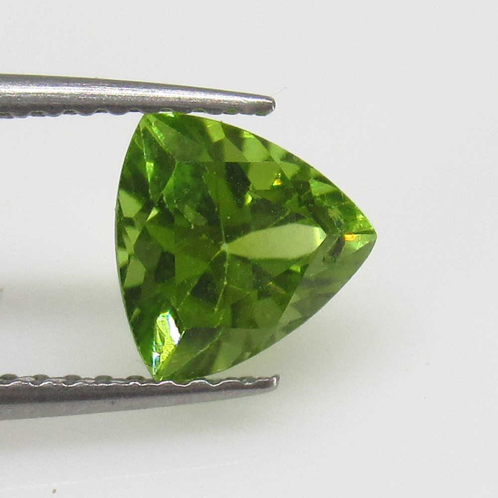 1.42 Ctw Natural Pakistan Peridot Trillion Cut: No Reserve! Title: 1.42 Ctw Natural Pakistan Peridot Trillion Cut Stone Clarity: VVS Gemstones: Peridot Carat Weights: 1.42 Size/Dimensions: 7.20 x 7.10 x 4.80 mm Additional Information: Top Class Lus