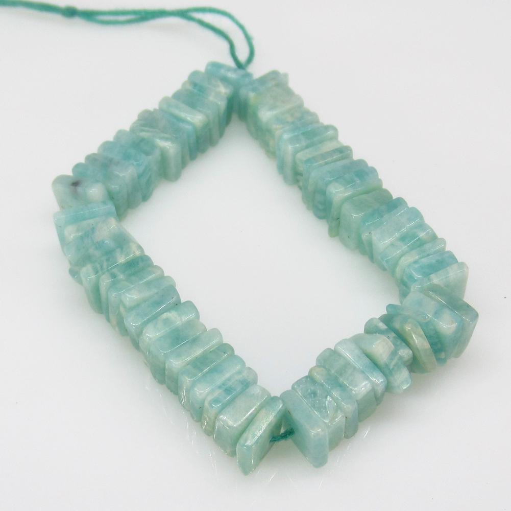 31.68 Ct Natural 63 Drilled Amazonite Square Flat Beads: No Reserve! Title: 31.68 Ct Natural 63 Drilled Amazonite Square Flat Beads Stone Clarity: Transparent Gemstones: Natural Amazonite Beads Carat Weights: 31.68 Size/Dimensions: 5.2x2.1 to 5.5x2.3 mm / 6