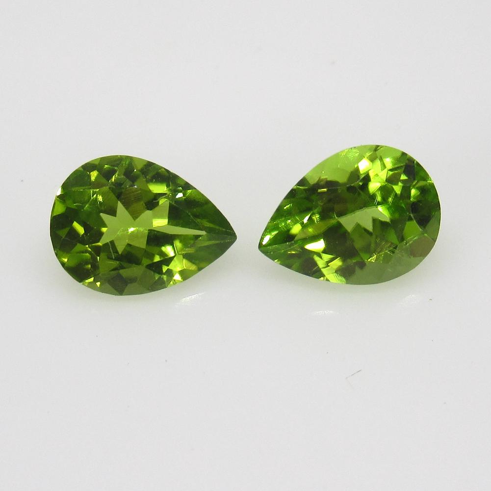 2.34 Ct Natural Pakistan Peridot Pear Pair: No Reserve! Title: 2.34 Ct Natural Pakistan Peridot Pear Pair Stone Clarity: VVS Gemstones: Natural Peridot Carat Weights: 2.34 Size/Dimensions: 7.90 x 6.00 x 4.40 mm / 2 PC's Additional Information: 