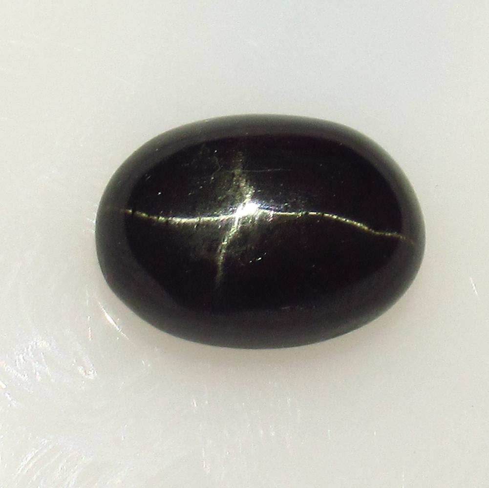 8.05 Ct Natural Sharp Line Black Diopside Oval Cab (1 of 2)