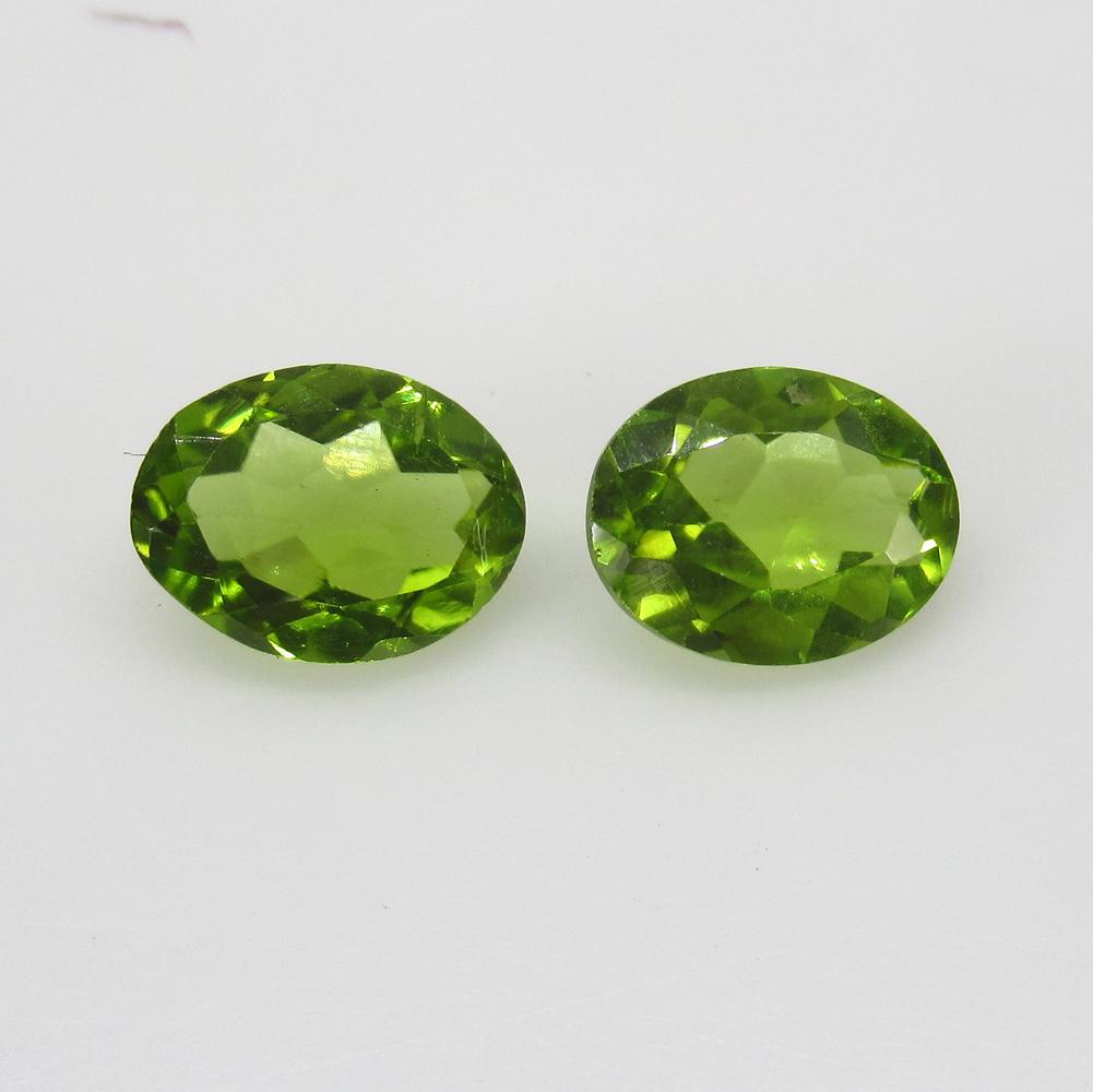 3.50 Ct Natural Pakistan Peridot Oval Pair: No Reserve! Title: 3.50 Ct Natural Pakistan Peridot Oval Pair Stone Clarity: VVS Gemstones: Natural Peridot Carat Weights: 3.5 Size/Dimensions: 9.20 x 7.00 x 3.70 mm / 2 PC's Additional Information: T