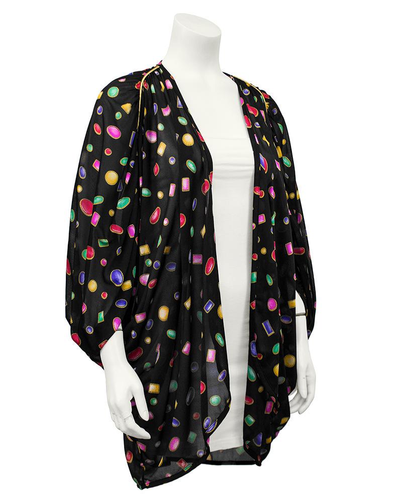 Oscar De La Renta Jewel Print Kimono: Gorgeous 1990s Oscar de la Renta swimwear line jewel printed kimono style coverup. Overall jewel print on a black background with marigold piping along the shoulders. Gathered effect with batwing styl