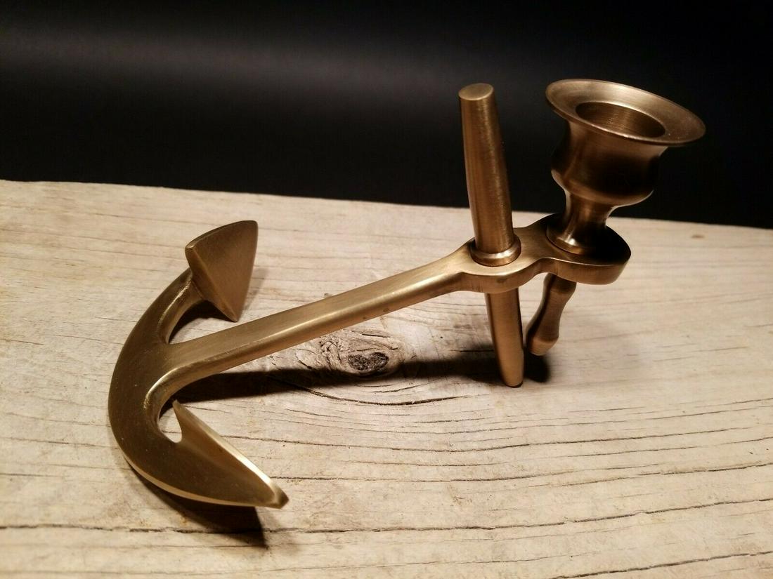 Brass Nautical Ships Boat Anchor Candle Holder: 5 1/4" long x 4 1/8" Wide Well made reproduction of an antique anchor paperweight candle holder. All solid brass, darkened to look old. Certainly easy to wonder its age Reserve: $15.00 Shipping: Domes