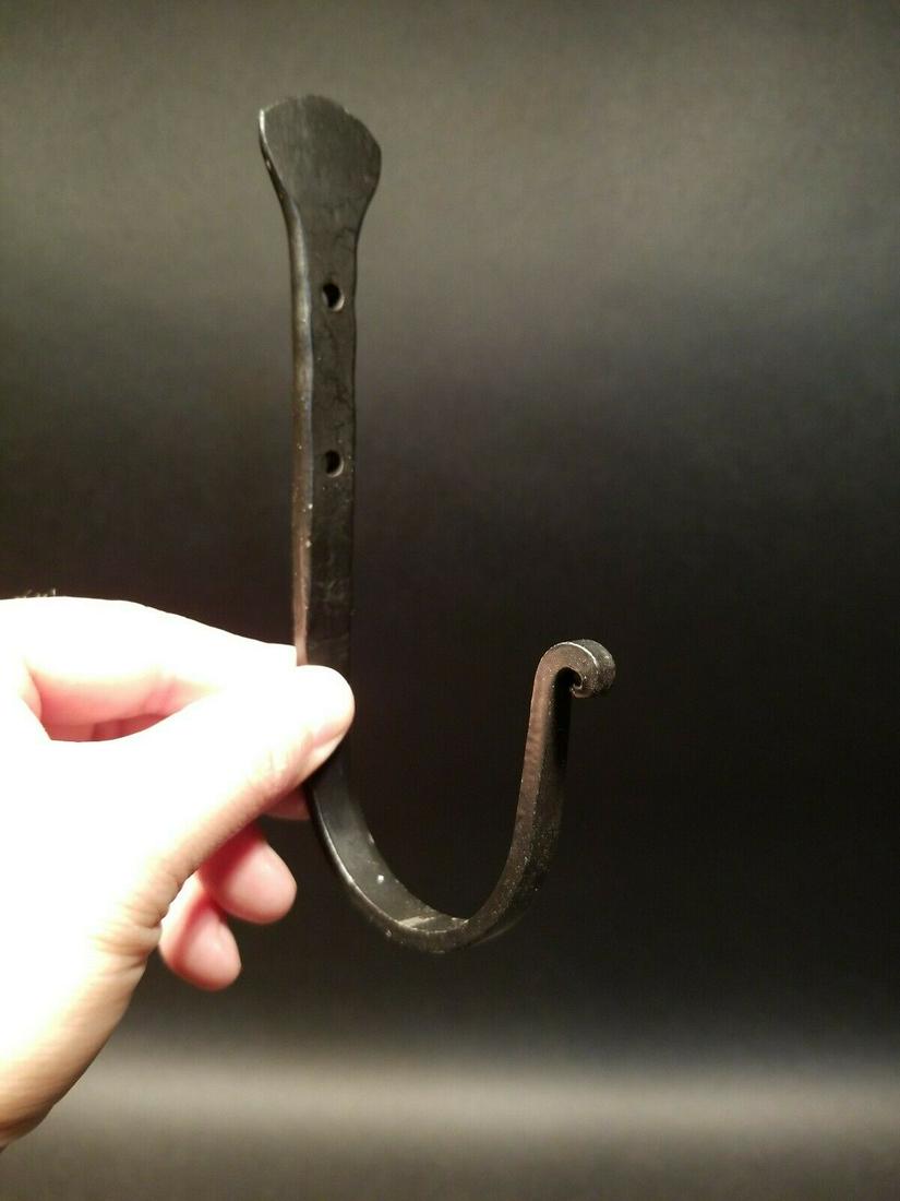 Wrought Iron Large Wall Hook: (1) Hook 6 1/4" Tall.. 3 1/8" Extension 1 Charming and functional sturdy iron wall hook. Hand forged to look like an antique. Great black baked on sturdy finish. Reserve: $11.00 Shipping: Domestic: Fl