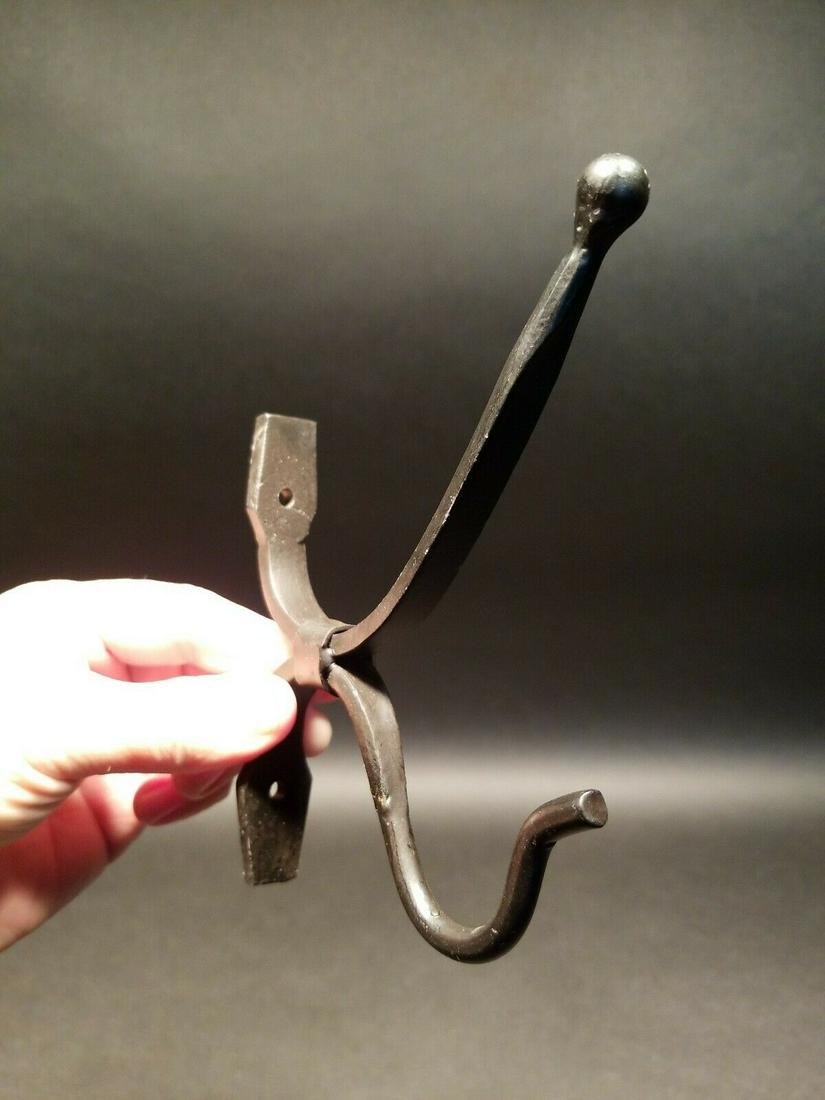 Blacksmith Forged Iron Coat Hat Hook: (1) Hook 6" Tall.. 4 5/8" Extension 1 Charming and functional sturdy iron coat and hat hook. Wonderfully hand forged made to look like an antique. Great black powder coating making for a really sturdy