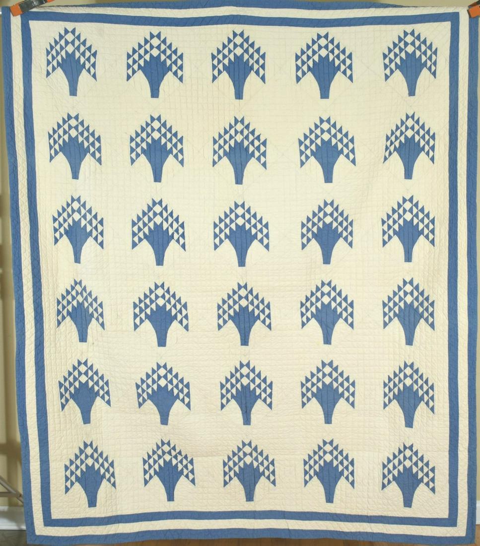 30's Blue & White Tree of Life Quilt: 20's/30's Blue & white tree of life quilt, all hand pieced and hand. quilted, with three border. Measures 66" X 78" and is in excellent. condition, with the occasional light age spot and no wear. The 