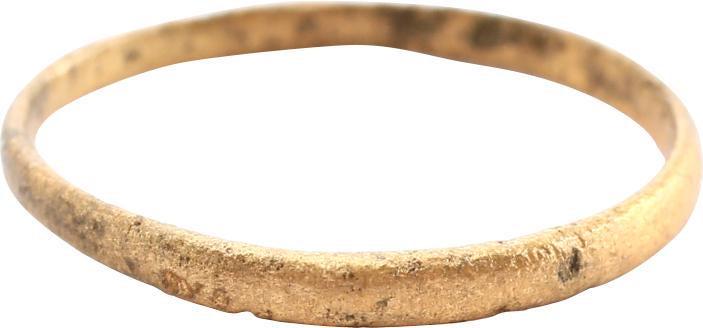 ANCIENT VIKING WEDDING RING SZ 7 ¾: Late 9th-11th century AD. Gilt bronze, size 7 3/4. 1.8mm width band with a low-rounded face. The inside with distinct tool marks from the removal of the central core after casting. Vikings exchanged r