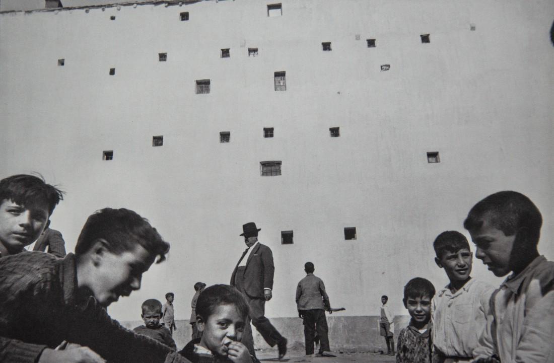 Henri Cartier-Bresson, Madrid, 1933: Artist: Henri Cartier-Bresson Title: Madrid, 1933 Medium: Photo Litho, 1979, USA Dimensions: 10.25x6.8" Additional Information: Heat Wax Mounted on 11x14" Conservation Board Artist Bio: Henri Cartier-