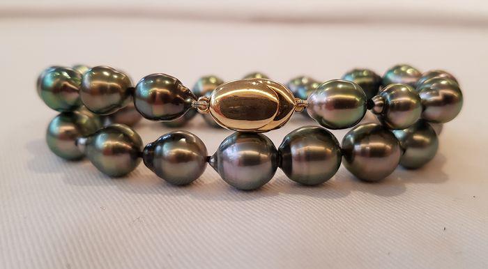 925 Silver - 8.5x11mm Peacock Tahitian Pearls -: This beautiful pearl bracelet features a double row of lustrous Tahitian pearls measuring 8.5x11mm. Emerging from the tropical lagoons of French Polynesia, the pearls have a natural beautiful Tahiti g