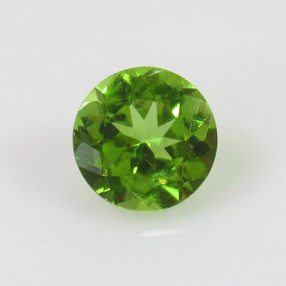 1.36 Ctw Natural Pakistan Peridot Round Cut: No Reserve! Title: 1.36 Ctw Natural Pakistan Peridot Round Cut Color/Clarity: VVS Gemstone: Peridot Carat Weight: 1.36 Size/Dimension: 7.00 x 7.00 x 4.30 mm Additional Information: Top Class Luster / 