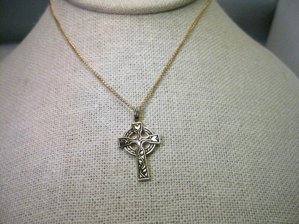 Vintage 14kt G.F. Celtic Cross on 20 Chain, signed TK: Vintage 14kt gold filled Celtic Cross or Gaelic Cross on 20" Chain. The back of the cross is marked 1/20 14kt G.F. and TK. The chain is marked 1/20 14kt G.F. and has a mark that I cannot read for the