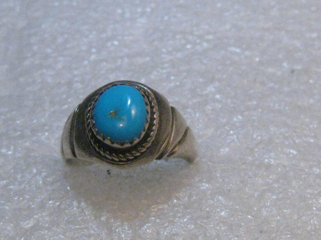 1970's Southwestern Sterling Silver Turquoise Ring,: Southwestern Sterling Silver Turquoise Ring, Vintage, 1970's, size 8.5. Weight is 5.14 grams. Marked and tested sterling. Not signed. This is a unisex ring down in a class ring style. The stone is app