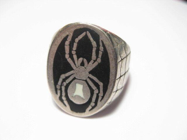 Vintage Man's Black Widow Spider ring, size 10.5 -: Vintage - unsigned unique(hard to find) large black widow spider ring with engraved webbing on the side panels of the ring. This is not sterling silver and some aging/wear patina is present on the sid