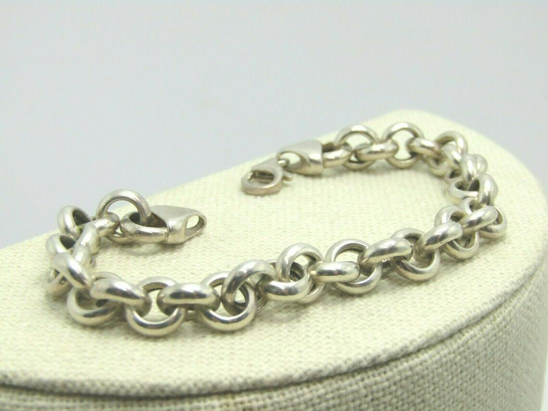 Vintage Sterling Rolo Link Bracelet, Unisex, 7.75", 6mm: Vintage Sterling Silver Rolo Bracelet, Women's/Men's/Unisex. 7.75, 6mm wide and 13 grams. Sturdy and heavy ends to the rolo chain with a lobster clasp. Signed sterling on clasp and bracelet, and Italy