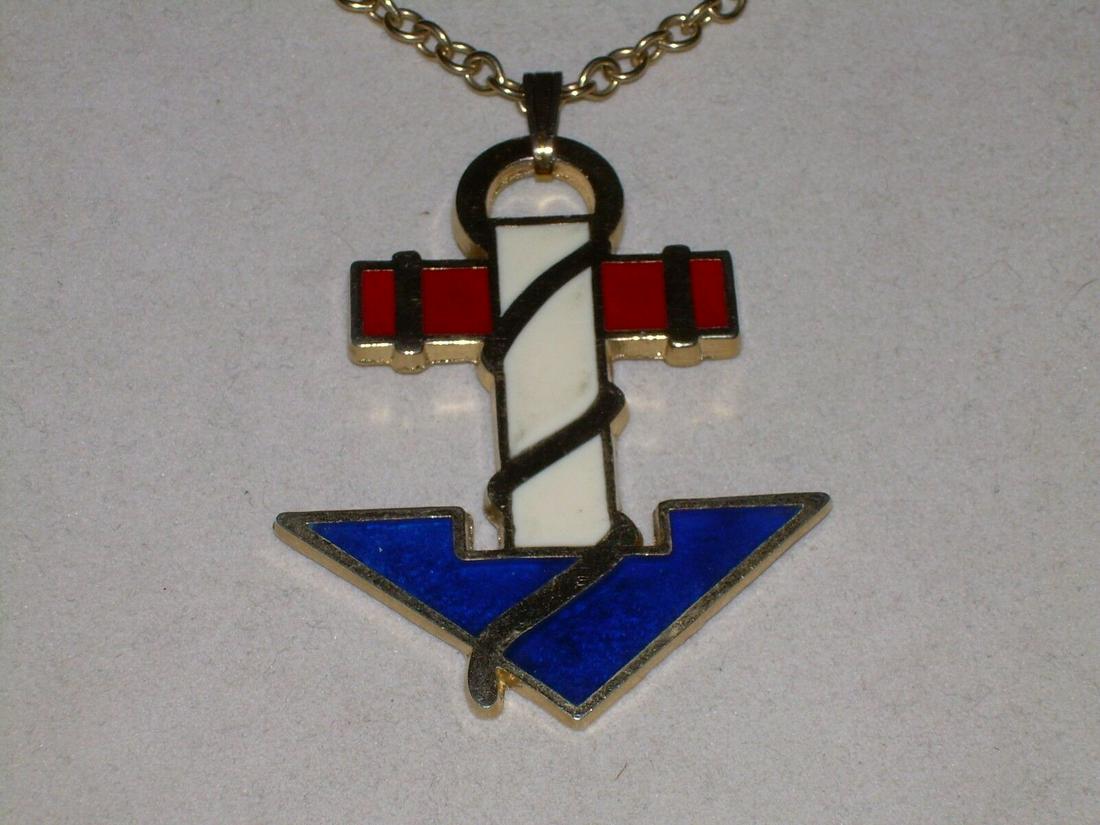 Patriotic Anchor Necklace W/Gold Tone Link Chain: Vintage patriotic necklace is red, white and blue with gold tone accents. There chain is a gold tone link. The chain is 24 in. long and the anchor is 2.5" in length and 1" at its widest point. It is i