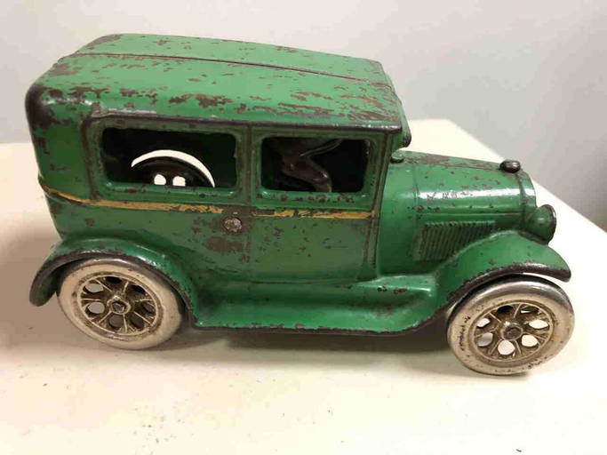 Cast Iron Toy Car By The Arcade Mfg. Co.,