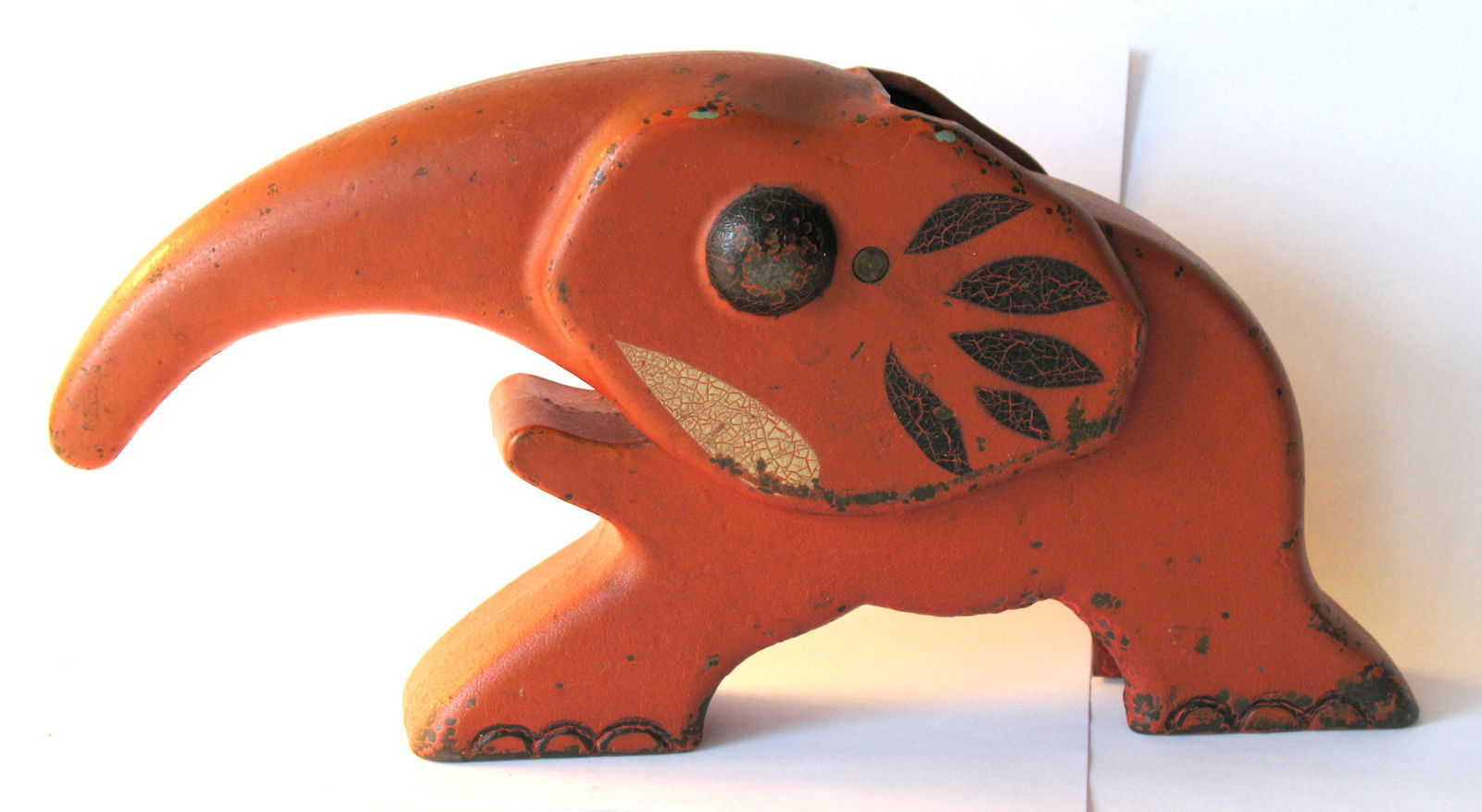 Whimsical cast iron elephant.: Title: Whimsical cast iron elephant. Description: Nice early cast iron elephant nut cracker in original paint and patina. Dimensions: 10” x 5” Circa: 1930's Shipping: Domestic: Flat-rate of $20.00