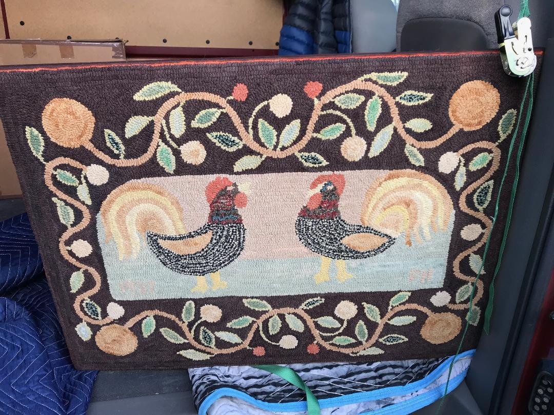 American Hooked Rug: American Hooked Rug. Cotton on Burlap Ground. Scene of Roosters on light Blue/grey ground with a colorful vine border Date: 1920 Origin American Artist/Maker Measurements 36" W x 24" H Shipp
