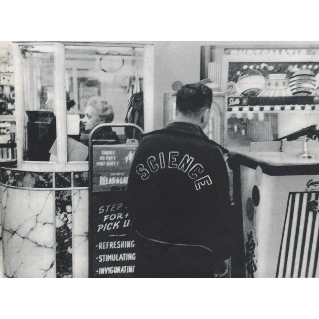 WILLIAM KLEIN - Arcade, New York: Artist: WILLIAM KLEIN Print Title: Arcade, New York Medium: Sheet-fed Gravure Printing Date: 1950's Printed in Switzerland Image Size Approx. 5.75 X 7.5 inches William Klein an American-born French ph