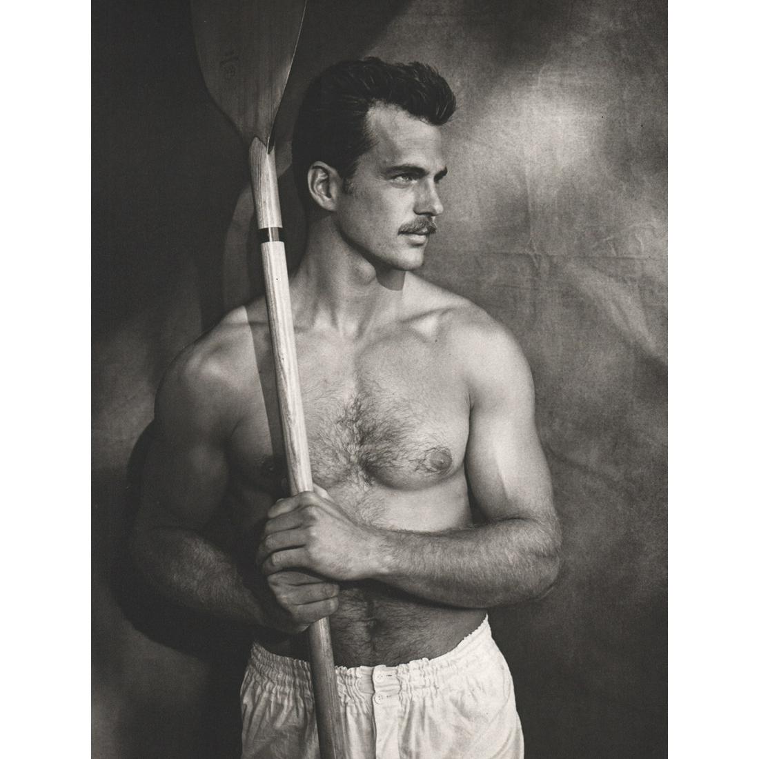 BRUCE WEBER - Dave Gilman, Kayaker 1983: Artist: BRUCE WEBER Print Title: Dave Gilman, Kayaker 1983 Medium: Sheet-fed Gravure Printing Date: 1980's Printed in Spain Image Size approx: 11 X 9 inches Bruce Weber is an American fashion photogra