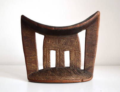 Arsi Neckrests: Title: Arsi NeckrestsDate/Period: XXth centuryMaterials: WoodDimension: 7" 1/8 and 6" 2/8Description: Two Arsi neckrests (Southern Ethiopia). Neckrests were used for protecting the elaborate hairdo's
