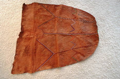 Maasai Apron Ex Sotheby's: Title: Maasai Apron Ex Sotheby'sDate/Period: XXth centuryMaterials: Leather, beadsDimension: 42" 1/8 x 43" 2/8Description: Apron for a married woman of the Maasai of Southern Kenya and Northern