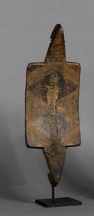 Jarawa Tray: Title: Jarawa TrayDate/Period: XXth centuryMaterials: Wood, native repairDimension: 17" 3/8Description: This tray is fully covered in fine pyrography. It is being used for carrying objects on the