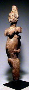 Bassa Maternity: Title: Bassa MaternityDate/Period: XXth centuryMaterials: WoodDimension: 20" 1/8Description: Ancient and weathered maternity figure of the Basa people, living at the confluent of the Niger and the
