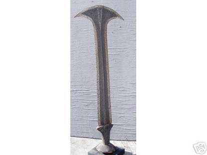Konda Knife: Title: Konda KnifeDate/Period: XXth centuryMaterials: Iron, wood, copperDimension: 18" 1/8Description: Konda knife from the Equateur region of D.R. Congo. On a custom base. Provenance : Edward