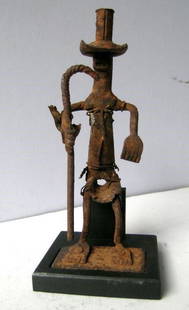 Fon Asen Figure: Title: Fon Asen FigureDate/Period: XXth centuryMaterials: IronDimension: 7" 1/8Description: Figure from an asen iron altar. Asen altars are memorials for the ancestors, unique to the Fon city of