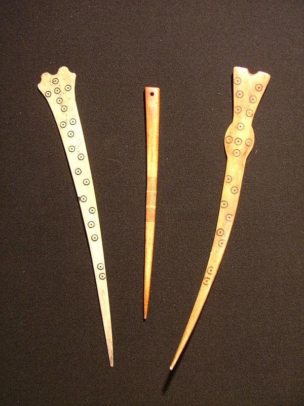 Naga Hairpins: Title: Naga Hairpins Date/Period: XXth century Materials: Bone Dimension: 8" 2/8 Description: Three decorated hairpins from the Naga people of the North-East border of India with Burma. The Naga have 
