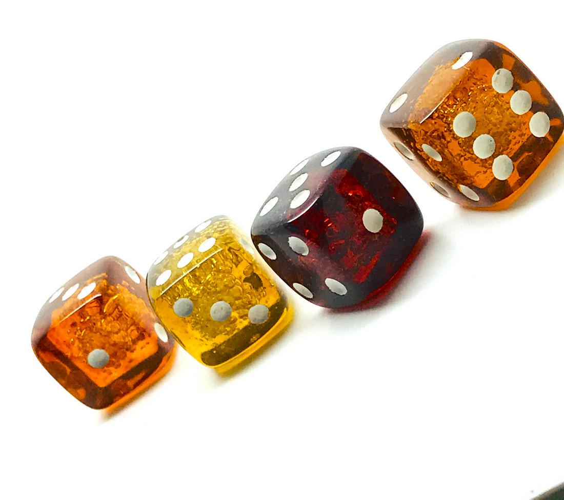 Unique and Stunning Amber Set of 4 Dices: Title: Unique and Stunning Amber Set of 4 Dices Origin: Lithuania Date/Period: 20th century Materials:Amber Size:Size: 17.6 x 17.6 x 17.6 mm Size: 0.693 x 0.693 x 0.693 inches Description:21.5 g, pres
