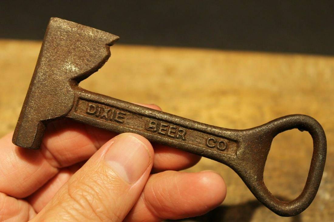 Cast Iron Dixie Beer Bottle Opener Fireman Axe Hatchet: 4 3/8" x 1 7/8" wide Well made reproduction antique cast iron "Dixie Beer Co" Bottle Opener Reserve: $15.00 Shipping: Domestic: Flat-rate of $5.00 to anywhere within the contiguous U.S. International: