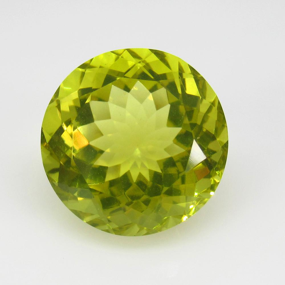 13.43 Ct Natural Lemon Quartz Round Cut: Title: 13.43 Ct Natural Lemon Quartz Round Cut Stone Clarity: VVS Gemstones: Natuarl Lemon Quartz Carat Weights: 13.43 Size/Dimensions: 15.00 x 15.00 x 10.80 mm Additional Information: Top Quality Lus