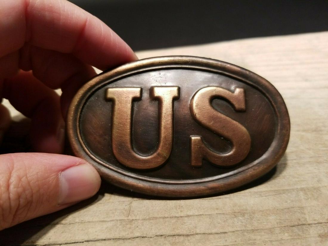 Civil War US Belt Buckle Puppy Paw 3 Prong Lead Brass: 3 3/8" long x 2 1/8" This all brass replica belt plate will surely make you wonder its age. It is made to look just like an antique The face of this plate has a very pleasing brown patina with slight