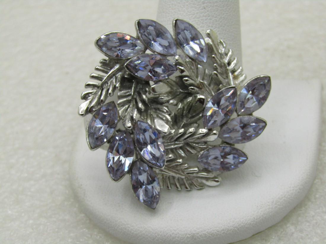 Vintage Early Dodds Lavender/Blue Rhinestone Brooch,: Vintage Early Dodds Rhinestone Brooch, Art Deco Theme, 1.5", signed 11 W 30 St Inc, 1960's. Silver tone with a a leaf design, marquise lavender/blue rhinestone set in clusters on an angle. Baby blue g