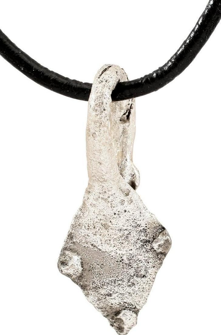ANCIENT VIKING SORCERER’S AMULET NECKLACE C.850-1050 AD: Slightly under 1 1/4" height. Bronze, originally silvered, shaped as a well delineated duck's foot with three webbed toes and large suspension loop. A burial at Viden, Denmark contained the body of a 