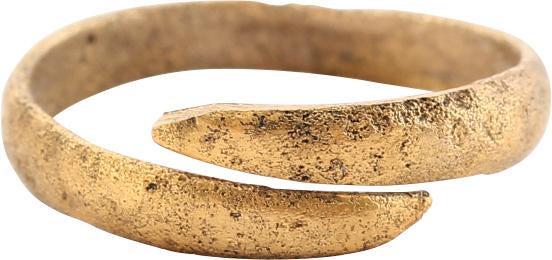 FINE VIKING COIL RING, 10th CENTURY AD JEWELRY SIZE 5 ¾: Size 5 3/4. Gilt bronze. Rounded face band in 1 1/4 coils to 4.9mm width. The coil or helix was a favorite form for Vikings and evidently held supernatural significance to them. Textured from burial. 