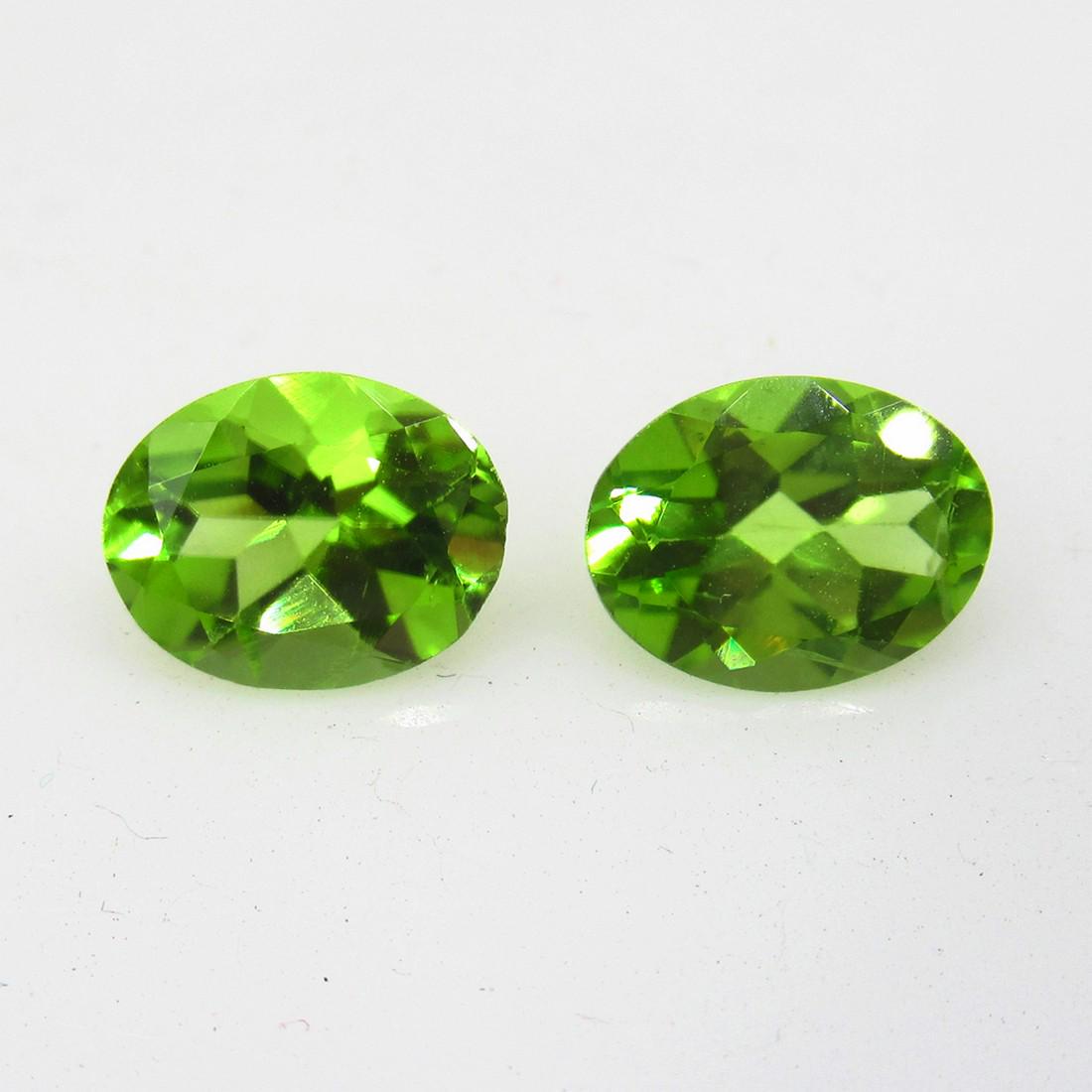 3.45 Ct Natural Pakistan Peridot 9x4 mm Oval Pair: Title: 3.45 Ct Natural Pakistan Peridot 9x4 mm Oval Pair Stone Clarity: VVS Gemstone: Natural Peridot Carat Weights: 3.45 Size/Dimensions:9.00 x 7.00 x 4 .00 mm / 2 PC's Additional Info:Top Class Full