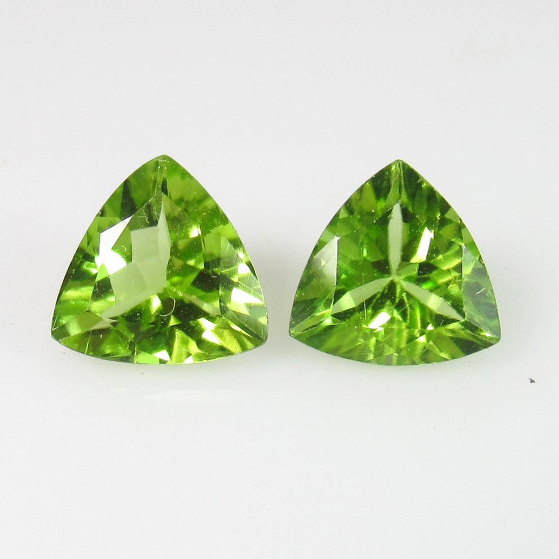 3.75 Ctw Natural Pakistan Peridot Trillion Pair: Title: 3.75 Ctw Natural Pakistan Peridot Trillion Pair Stone Clarity: VVS Gemstone: Peridot Carat Weight: 3.75 Size/ Dimensions:8.10 x 8.00 x 5.20 mm / 2 PC's Additional Info:Top Class Luster / Excell