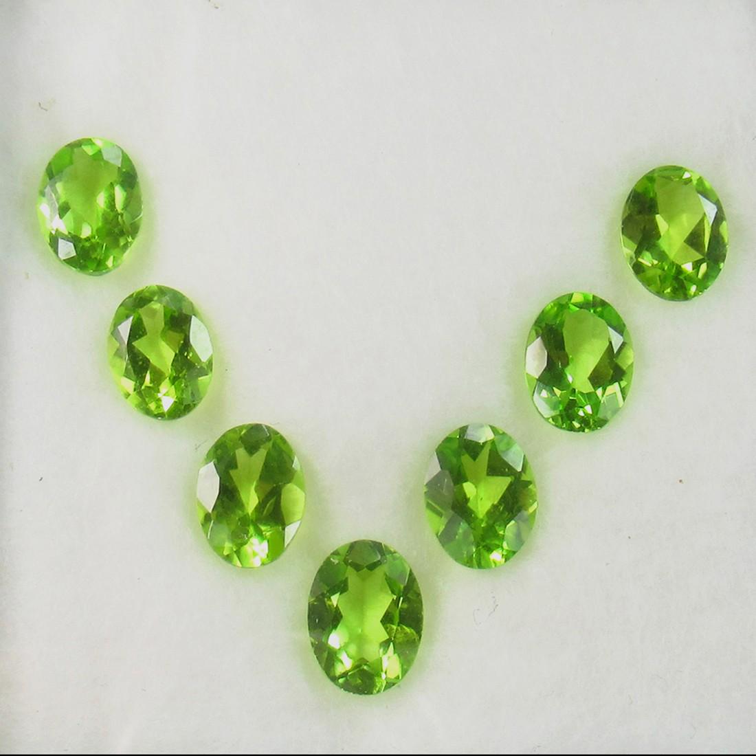 8.57 Ct Natural 7 Pakistan Peridot Oval Necklace Set: Title: 8.57 Ct Natural 7 Pakistan Peridot Oval Necklace Set Stone Clarity: VVS Gemstone: Natural Peridot Carat Weights: 8.57 Size/Dimensions:7.7x5.6 - 8.0x5.7 mm / 7 PC's Additional Info:Top Class Ful