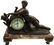 Patinated Metal and Marble Figural Mantel Clock