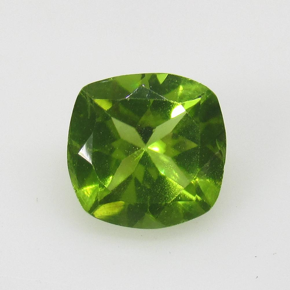1.44 Ctw Natural Pakistan Peridot Cushion Cut: No Reserve! Title: 1.44 Ctw Natural Pakistan Peridot Cushion Cut Stone Clarity: VVS Gemstones: Peridot Carat Weights: 1.44 Size/Dimensions: 7.00 x 6.90 x 4.20 mm Additional Information: Top Class Lust