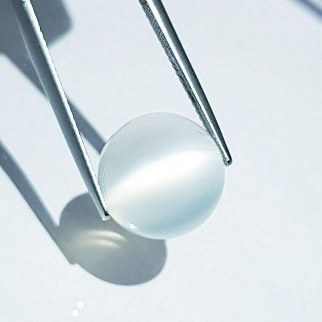 Natural Moonstone Cat's Eye- 10.78 ct: No Reserve! Title: Natural Moonstone Cat's Eye- 10.78 ct Color/Clarity: VVS Gemstones: Loosegemstone Carat Weights: 10.78 Size/Dimensions: 13.50 x 13.50 x 8.80 Additional Information: Round - Srilanka