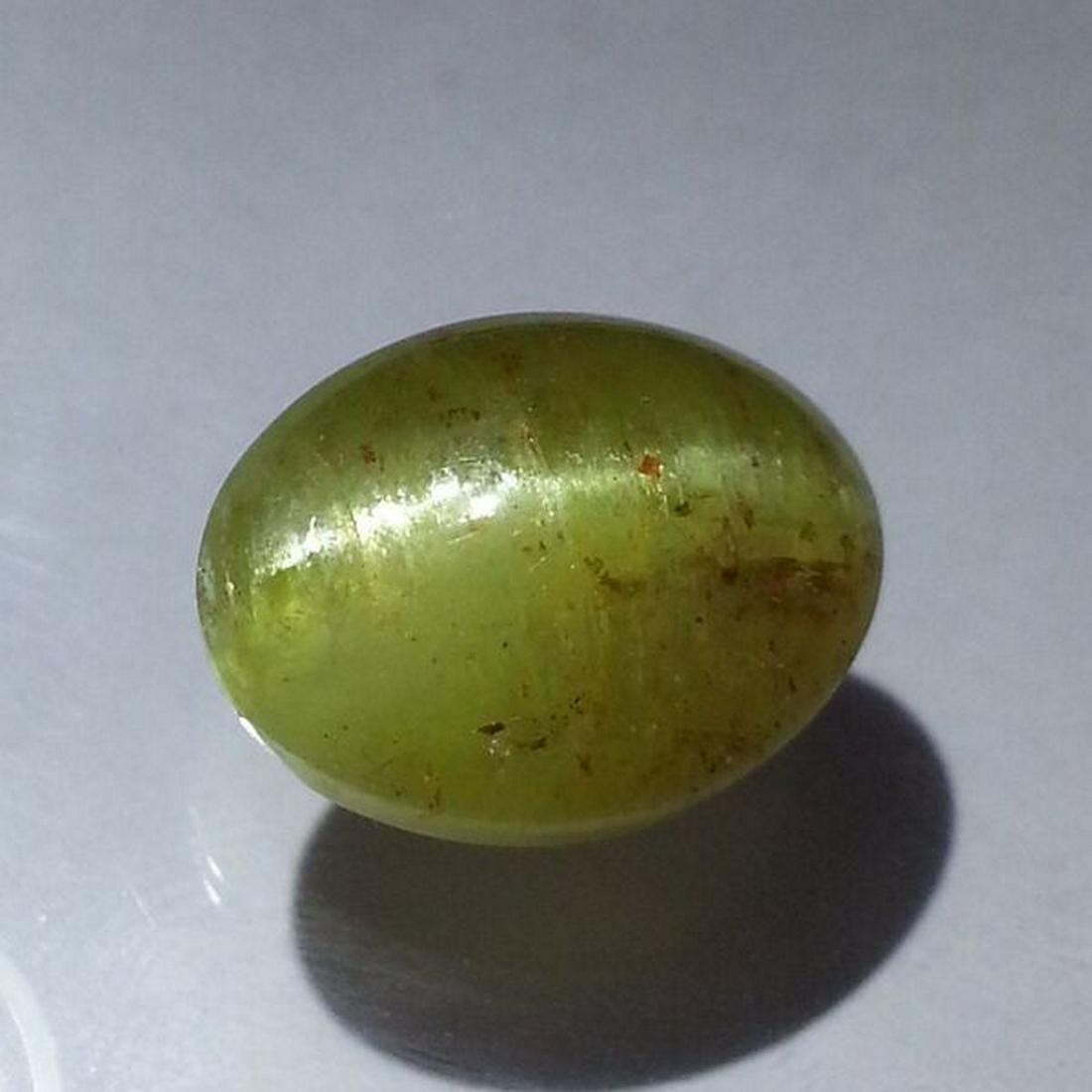 20.17 ct Natural Apatite cat's Eye: No Reserve! Title: 20.17 ct Natural Apatite cat's Eye Color/Clarity: Semi Transparent Gemstones: Loosegemstone Carat Weights: 20.17 Size/Dimensions: 17.00 x 13.50 x 10.80 Additional Information: Oval 