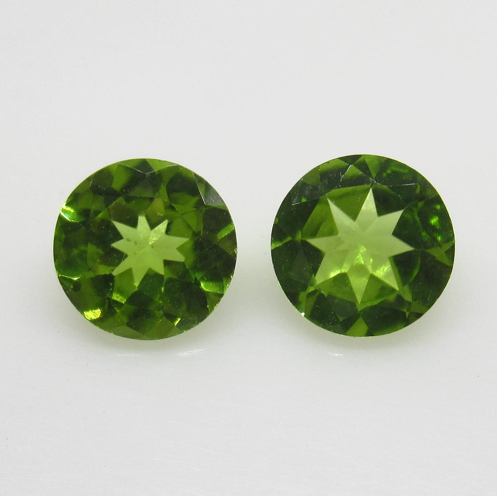 2.43 Ct Natural Pakistan Peridot Round Pair: No Reserve! Title: 2.43 Ct Natural Pakistan Peridot Round Pair Stone Clarity: VVS Gemstones: Natural Peridot Carat Weights: 2.43 Size/Dimensions: 7.00 x 7.00 x 3.60 mm / 2 PC's Additional Information: