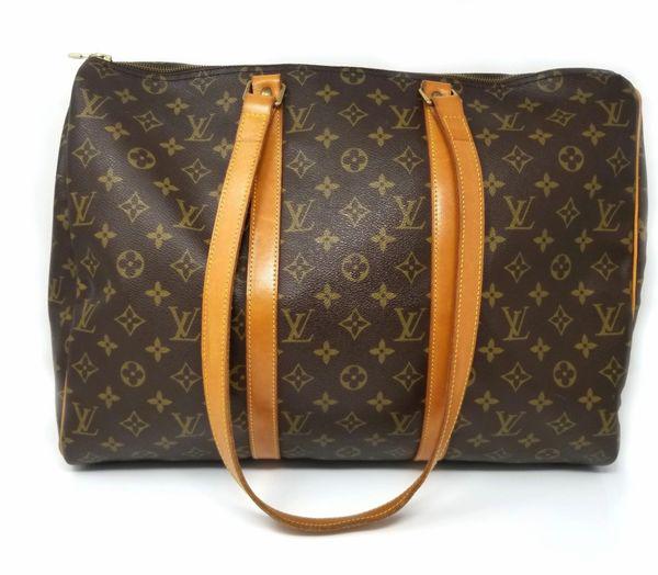 Louis Vuitton Monogram Sac Flanerie Tote Shoulder Bag: We offer this Louis Vuitton Vintage Monogram Sac Flanerie Shoulder Bag. So love vintage Louis Vuitton! This bag will hold a tremendous amount and is great for travel. Beautiful Vintage Bag!! This bag 