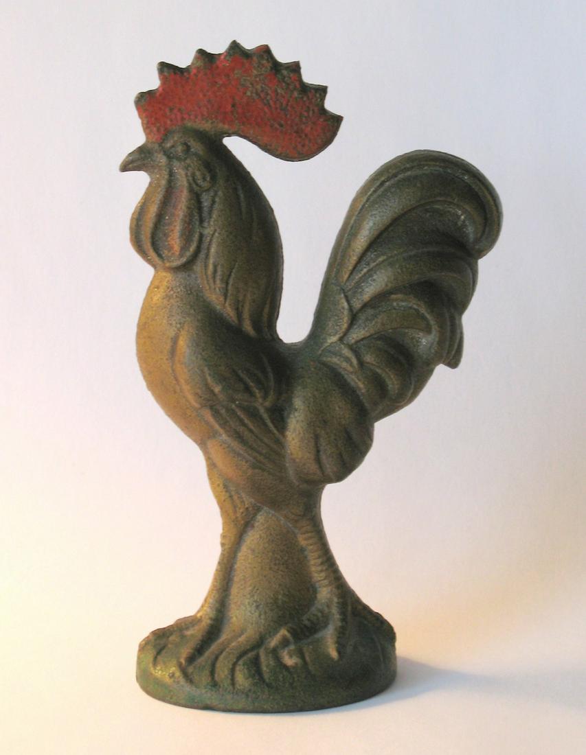 Early cast iron rooster.: Title: Early cast iron rooster. Description: Very nice early cast iron rooster in great original painted surface. Perhaps a paperweight? Dimensions: 4 1/2” tall Circa: 1930's Shipping: Domestic: Fla