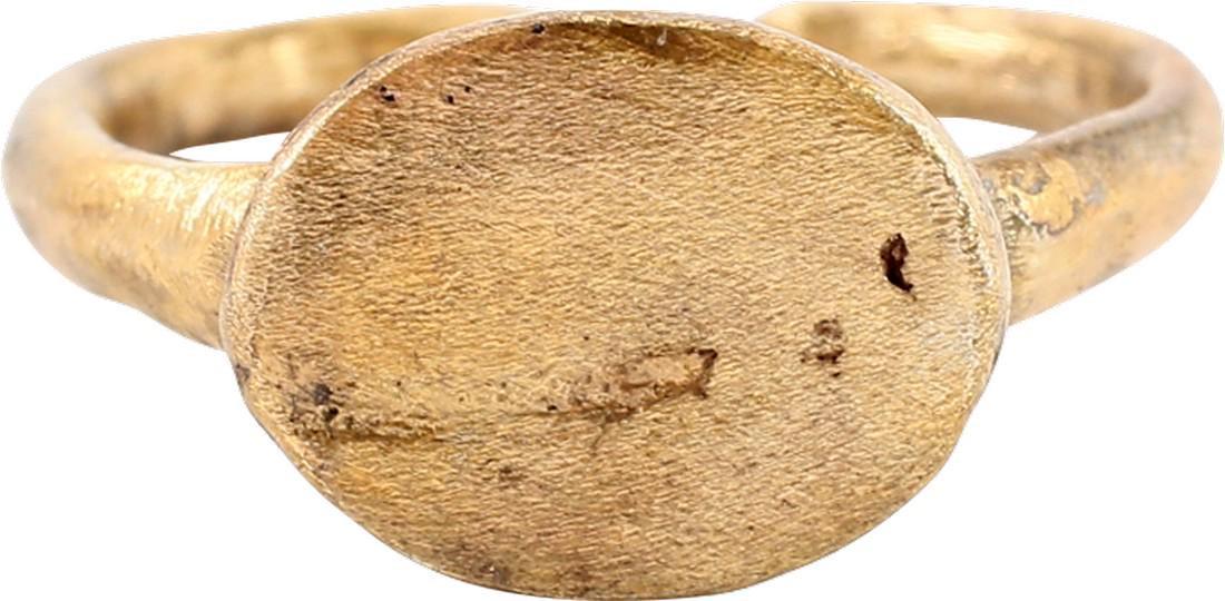 MEDIEVAL MAN’S RING SZ 5 1/4. Early Christian period,: Size 5 1/4 for the small finger as was the custom with 2.3mm width band flared at the shoulders and rounded section. Oval form and the bottom nubbed in the Roman taste. Oval bezel with remnants of an 