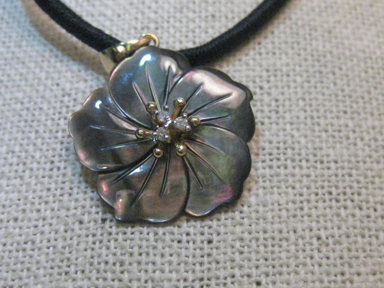 14Kt Gold & Diamond MOP Flower Necklace, 17.5", signed: Vintage 90's Carved MOP Flower Necklace - with diamonds, signed PJS, 17.5". This has a 2.5mm round black satin necklace that is capped in 14kt gold. It has a shimmery mocha-ish carved mother-of-pearl 